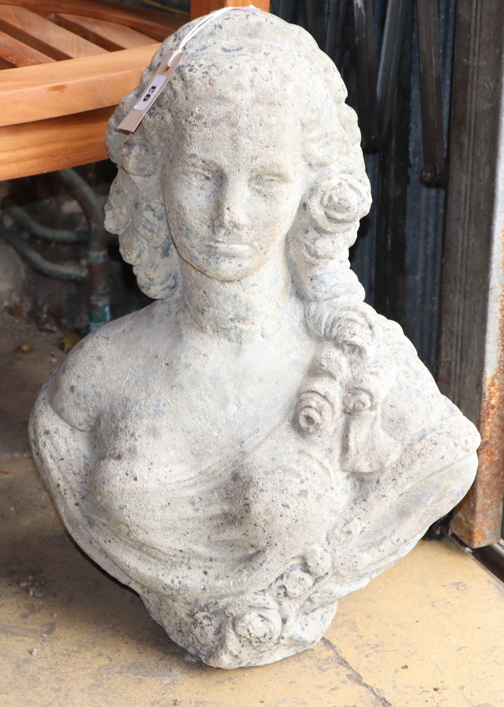 A reconstituted stone garden bust, H.50cm